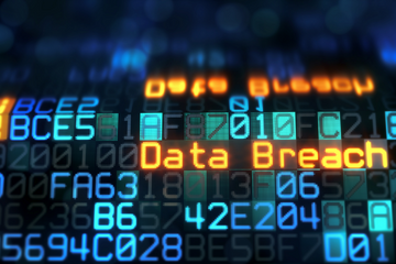 Data breach in orange text on a computer screen